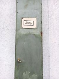 Close-up of white door