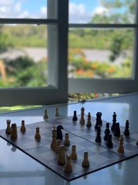 High angle view of chess pieces on table