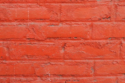 Close-up of red brick wall