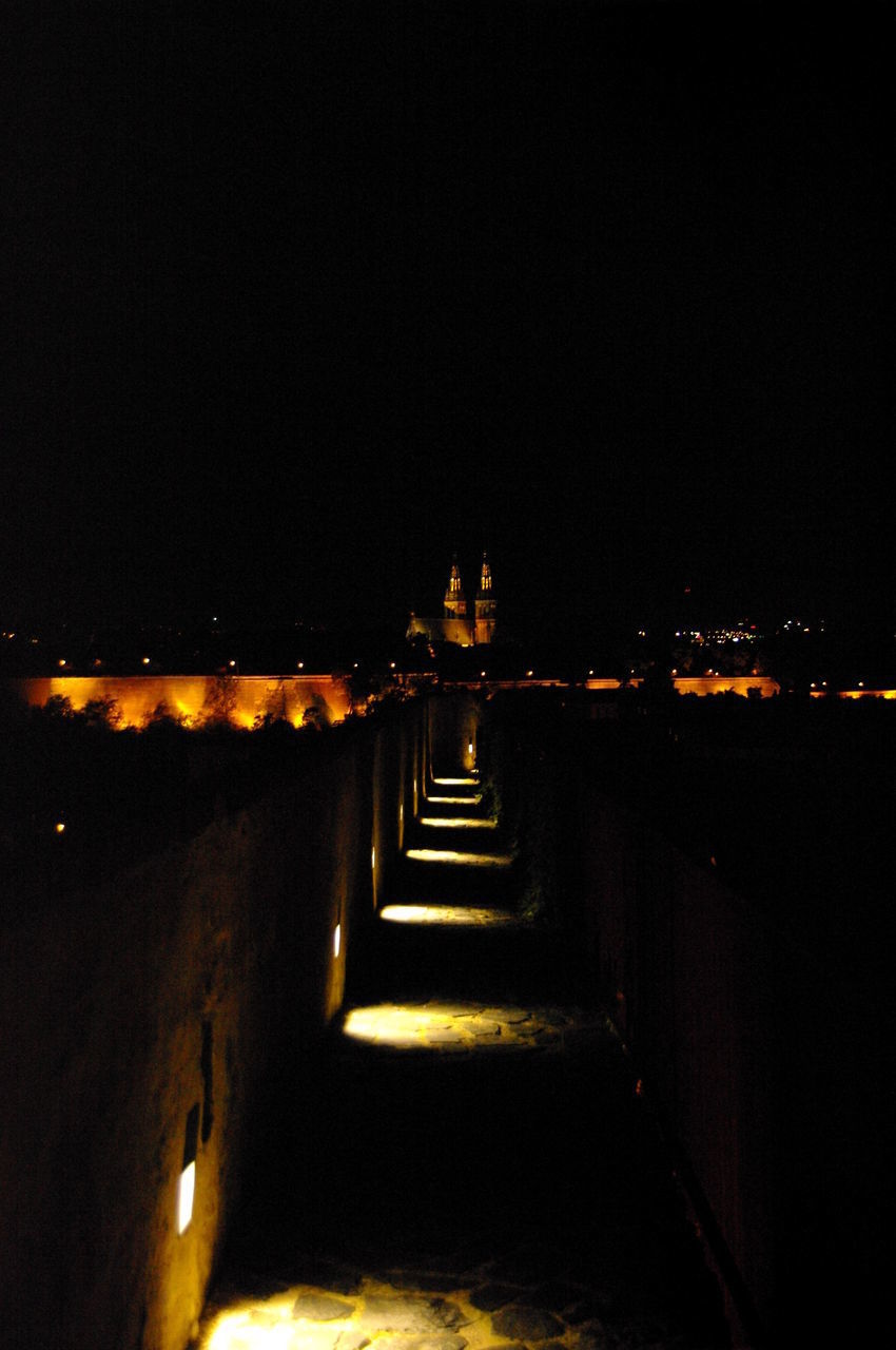 ILLUMINATED MOSQUE AT NIGHT