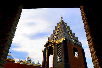 Low angle view of temple building against sky