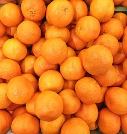 Full frame shot of oranges at market stall