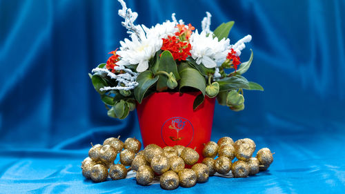 Close-up of red flowers on table