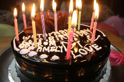 Close-up of candles on table