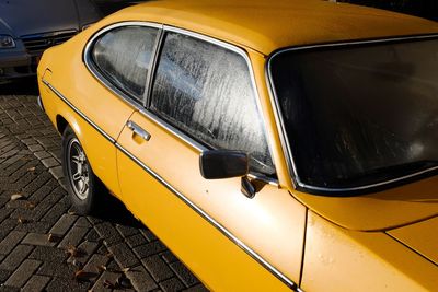 Close-up of yellow car