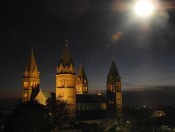 Illuminated cathedral against sky at night