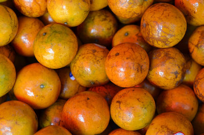 Full frame shot of oranges at market stall