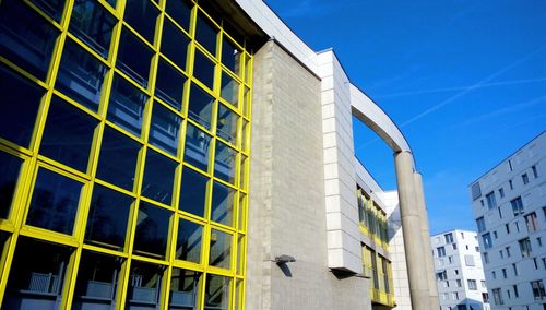 Low angle view of modern building against sky