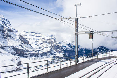 Snow covered mountain against sky