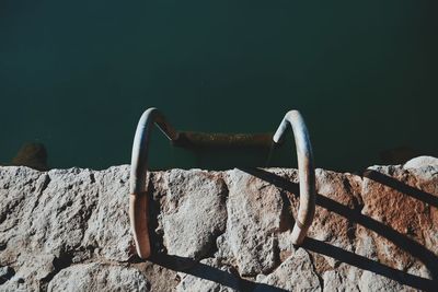 High angle view of railing by pool