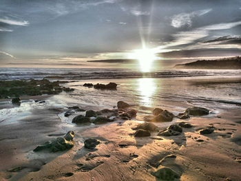 Scenic view of sea at sunset