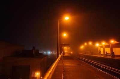 Illuminated street lights at night