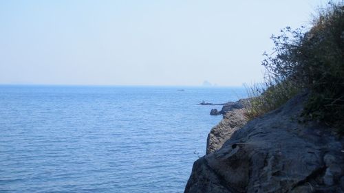 Scenic view of sea against clear sky