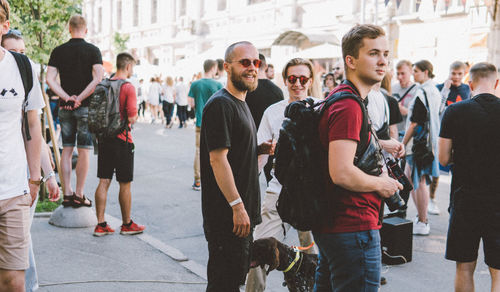 People walking on street in city