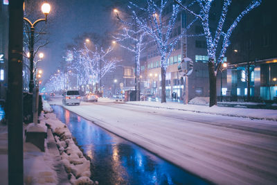 Illuminated street at night