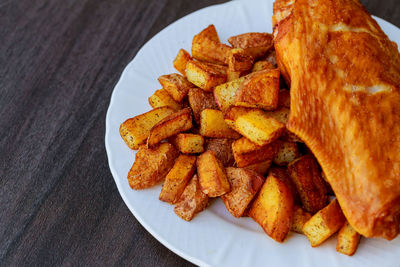 Fried food in plate on table