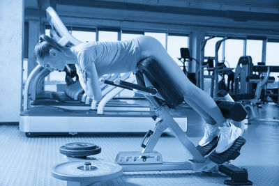 Man exercising in gym