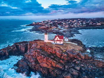 Scenic view of sea and rocks against sky