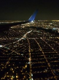 Aerial view of illuminated cityscape