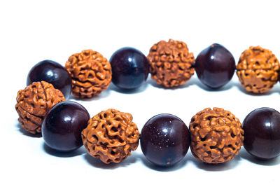 Close-up of cookies against white background