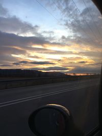 Road against sky during sunset