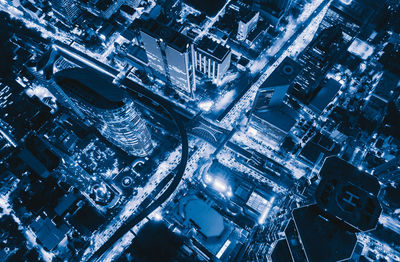 High angle view of illuminated cityscape at night