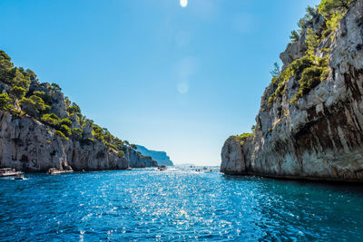 Scenic view of sea against clear blue sky