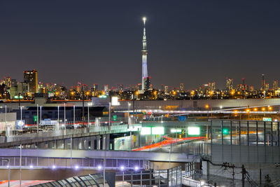 Illuminated buildings in city at night