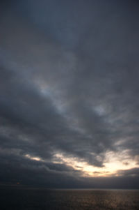 Scenic view of landscape against cloudy sky