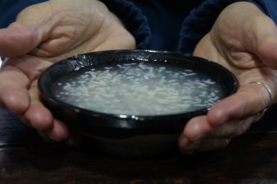 Close-up of human hand holding drink