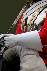 Midsection of man in period costume while standing outdoors