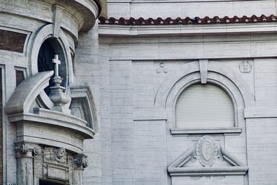 Low angle view of statue against building