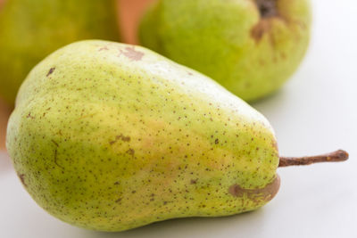 Close-up of bananas against white background