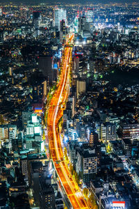 Aerial view of illuminated cityscape at night