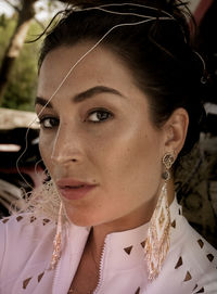 Close-up portrait of young woman