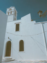 Low angle view of white building against sky