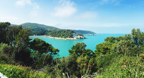 Scenic view of sea against cloudy sky