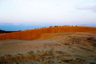 Scenic view of desert against sky