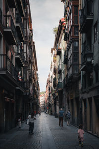 Street amidst buildings in city