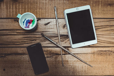 Directly above view of mobile phone on table