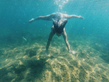 Man swimming in sea
