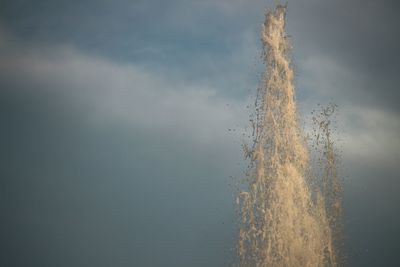 Low angle view of vapor trails in sky