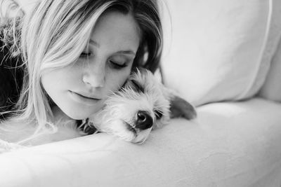 Close-up of woman with dog