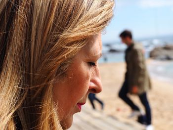 Close-up of mature woman at beach