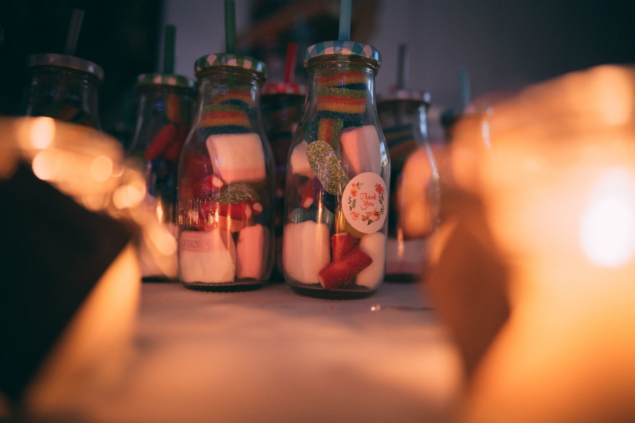 CLOSE-UP OF WINE GLASS ON TABLE