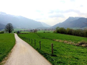 Country road passing through landscape