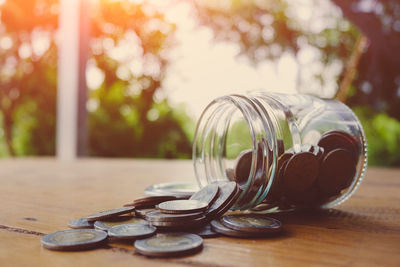 Close-up of coins on table