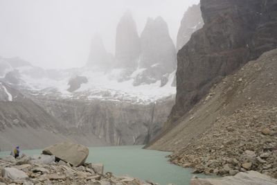 Scenic view of mountains and foggy weather