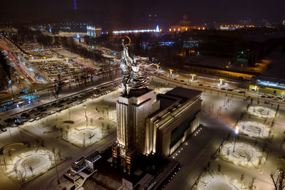 High angle view of illuminated cityscape at night