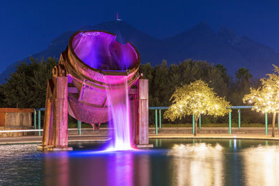 Low angle view of fountain against sky